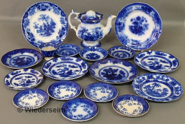 Eighteen pieces of Flow Blue tableware to include: Eighteen pieces of Flow Blue tableware to include plates, bowls, coffeepot 9"h., etc.