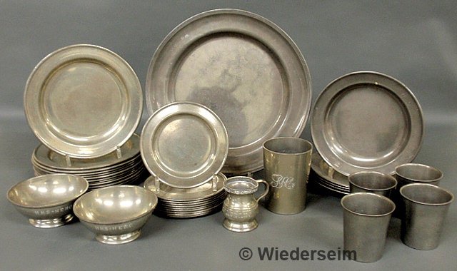 Thirty-six pieces of pewter tableware, some marked: Thirty-six pieces of pewter tableware, some marked "Jane Teller, Locust Valley, NY", early pewter charger 13"dia., four beakers, etc.