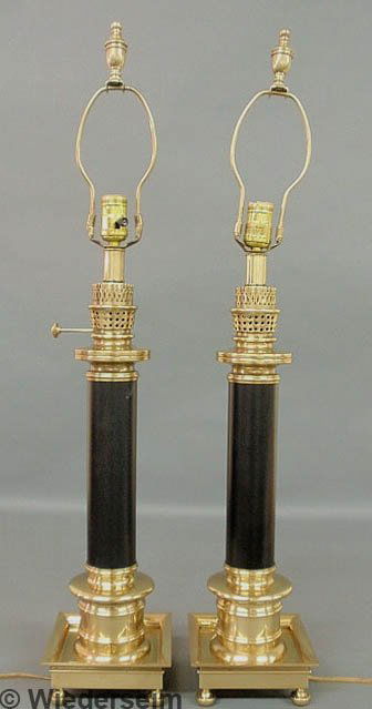 Pair of Frederick Cooper, Chicago brass column lam: Pair of Frederick Cooper, Chicago brass column lamps with black reserves. 25"h. top of socket, 33.5"h. overall