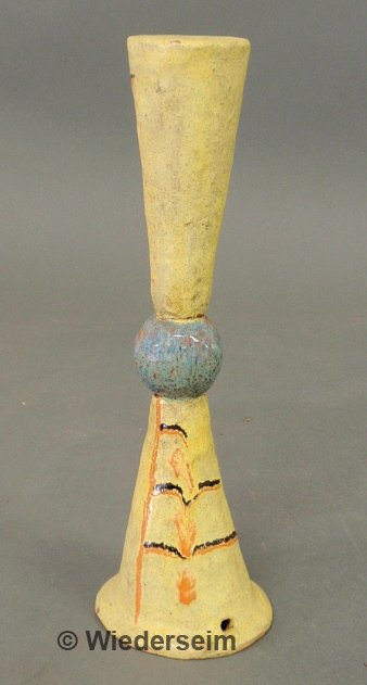 Yellow glazed earthenware object marked "Made in A: Yellow glazed earthenware object marked "Made in Austria" and with Wiener-Werkstatte marks and "KR". Repaired. 11.75"h.