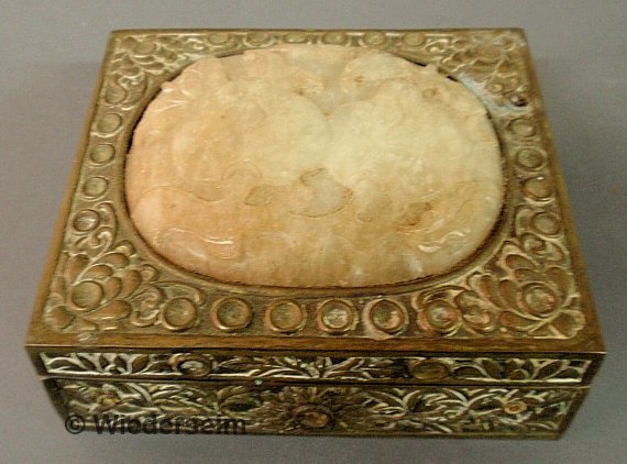 Asian decorated brass box, 19th c., the lid decora: Asian decorated brass box, 19th c., the lid decorated with a carved jade inset and with a brass interior. 3"h.x5"x5.75"