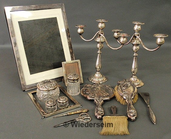 Sterling silver picture frames, sterling dresser s: Sterling silver picture frames, sterling dresser set, weighted sterling candelabra, etc.