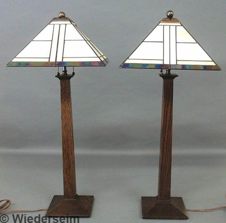 Pair of contemporary oak table lamps signed "Stic: Pair of contemporary oak table lamps signed "Stickley" with glass shades. 29"h.x12"w.