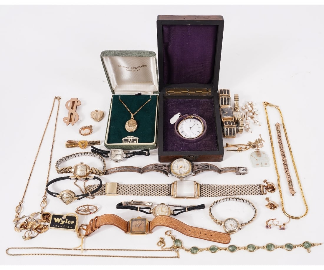 GROUPING 10K GOLD JEWELRY: Grouping of 10k gold jewelry to include watches, bracelets, money clip, heart locket, etc. All marked 10k. Green stone bracelet: 7.5"l