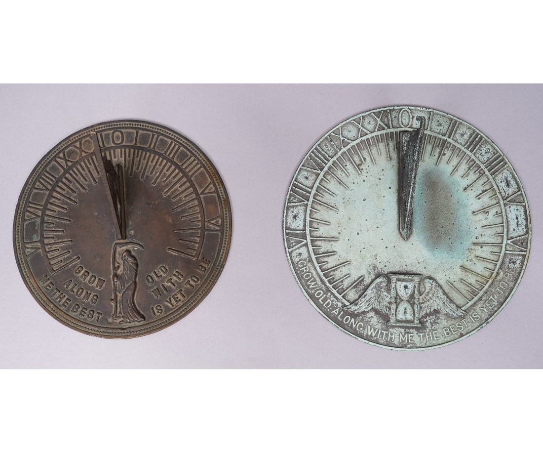 TWO GARDEN SUNDIALS: Two bronze garden sun dials, the larger with verdigris finish, the smaller is probably by Virginia Metalcrafters. Largest: 4"h x 4dia