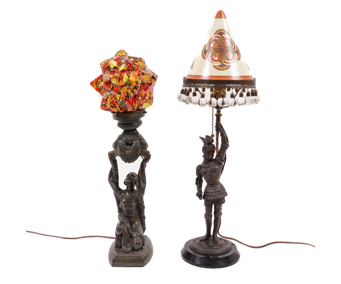 TWO FAUX BRONZE ACCENT LIGHTS: Two faux bronze metal accent lights to include a spelter metal "Joan of Arc" lamp with a colorful faceted glass shade; the other of a Roman soldier with a Bellova-style shade rimmed with clear glass b