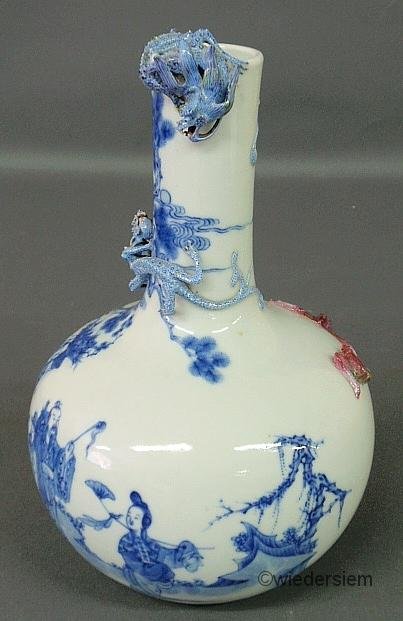 Blue and white Chinese porcelain Chien-lung vase, c: Blue and white Chinese porcelain Chien-lung vase, c.1850, decorated with dragons and bats and depicting the Eight Helpers. 12”h.