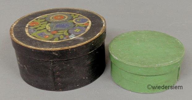 Round blue painted box with tulip decoration 4.5”h: Round blue painted box with tulip decoration 4.5”h.x9”dia. and a green example, the top signed “Burr” 3”h.x7”dia.