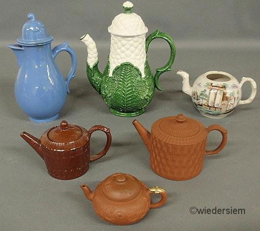 Five ceramic and earthenware teapots, some Asian e: Five ceramic and earthenware teapots, some Asian examples, tallest made in Italy 10.5”h.