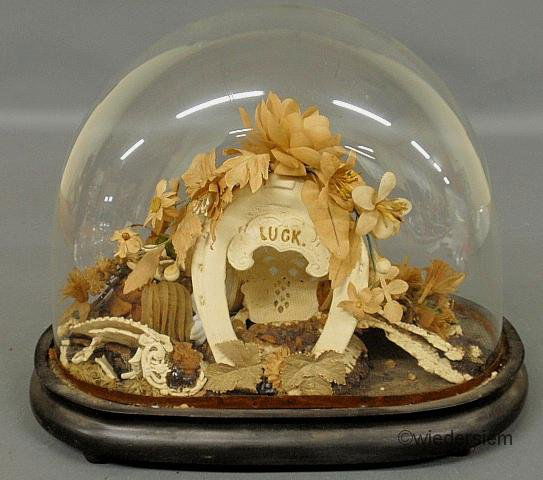 Glass domed Victorian naturalistic fauna on a carv: Glass domed Victorian naturalistic fauna on a carved black oval base. 10”h.x12”w.