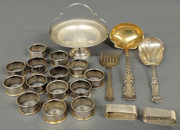 Group of sterling silver serving pieces, napkin ri: Group of sterling silver serving pieces, napkin rings (some marked sterling) and a weighted candy dish.