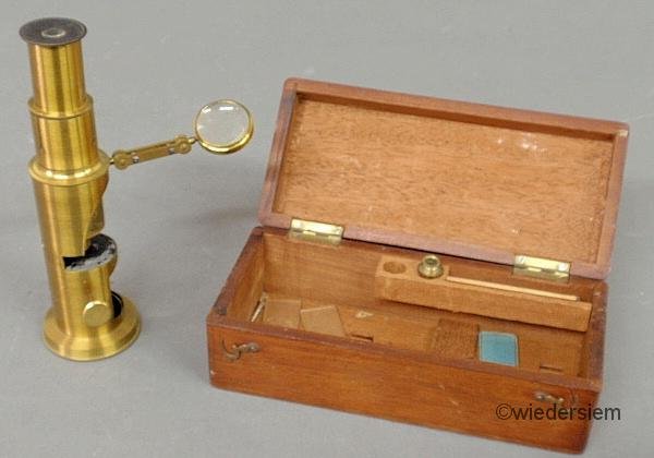 Small mahogany cased brass microscope with slide. : Small mahogany cased brass microscope with slide. Box 2”h.x6.5”w.