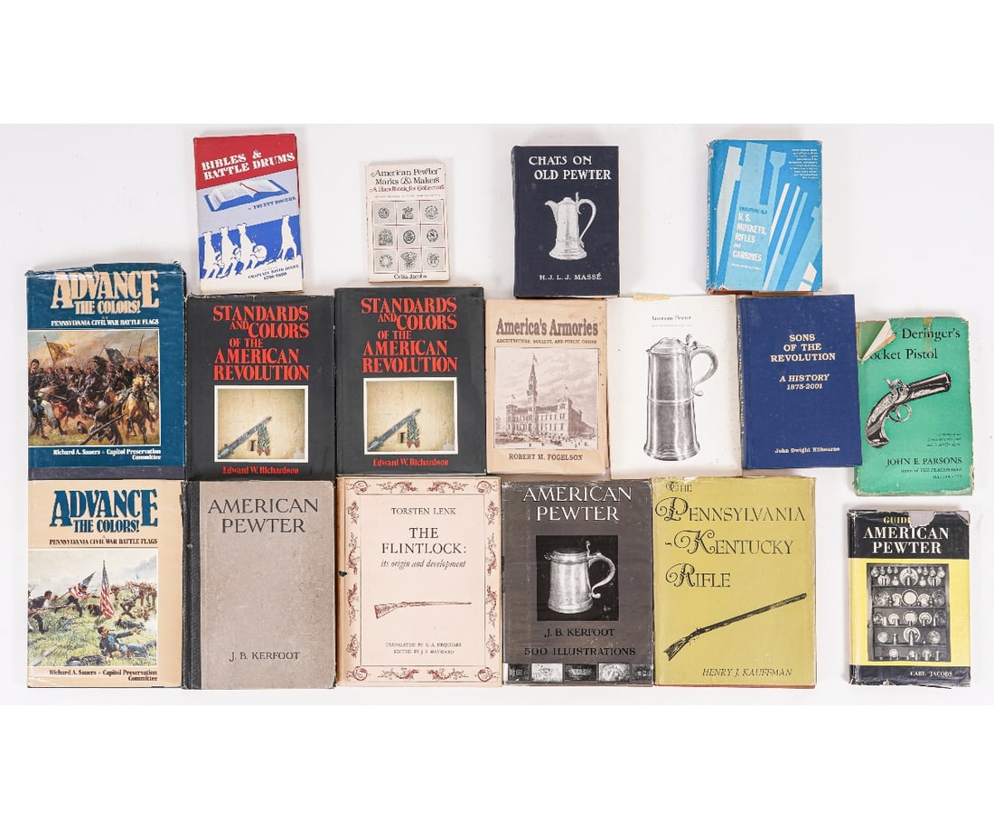 BOOKS AND PAMPHLETS ON FIREARMS & PEWTER: Seventeen books and pamphlets on firearms and pewter to include "American Pewter", "The Pennsylvania Kentucky Rifle", "Standards and Colors of the American Revolution", "America's Armories", etc.