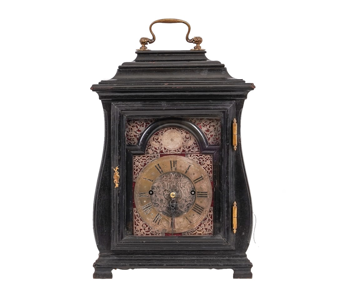 GEORGIAN BRACKET CLOCK: Mid 18th c. Georgian bracket clock signed "Cabriers, London" circa 1780 in an ebonized bombe form case with brass silvered dial, three train time and strike movement and two bells.19"h x 12"w x 5.5"d