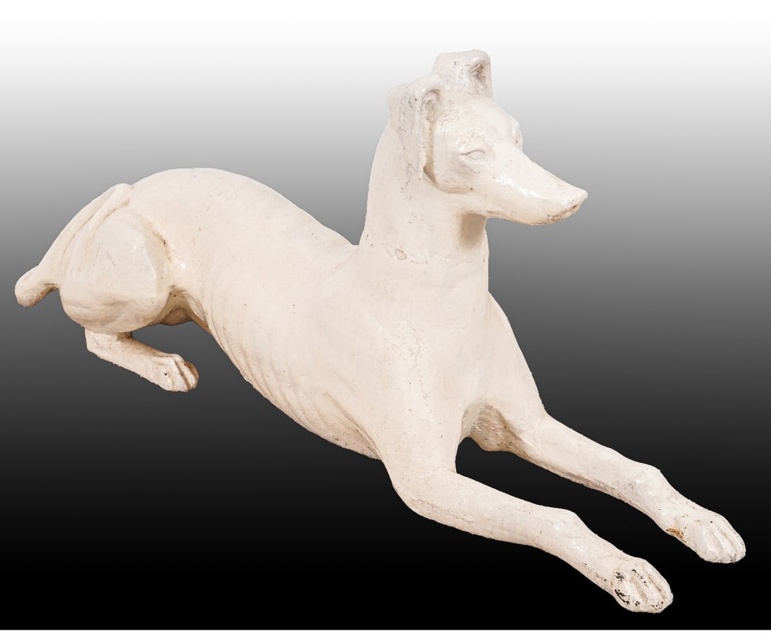 CAST IRON WHIPPET: American made cast iron recumbent Whippet, late 19th c., attributed to J.W. Fiske, painted white.18"h x 36"l x 17"w
