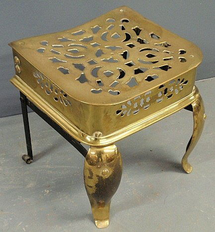 English brass fireplace trivet, early 20th c. 13.5”h.x1: English brass fireplace trivet, early 20th c. 13.5”h.x14”w.x12”d.