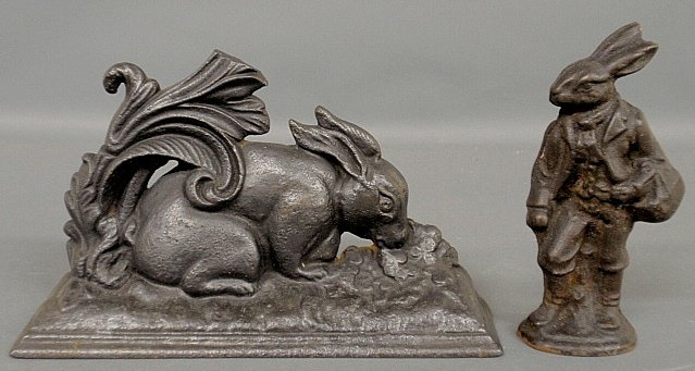 Continental cast iron rabbit form doorstop 6.5”h.x10.5”: Continental cast iron rabbit form doorstop 6.5”h.x10.5”l., c.1870, and a cast iron standing rabbit doorstop 7”h.