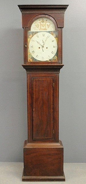 English Chippendale mahogany eight-day tall case clock: English Chippendale mahogany eight-day tall case clock with Masonic emblem. 81”h.