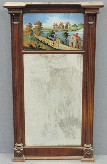 Sheraton mahogany mirror with reverse painted panel of : Sheraton mahogany mirror with reverse painted panel of a man on horseback riding down a road. 32.5”h.x18.25”w.