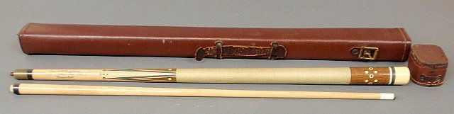 Rare leather cased billiard cue inscribed “David B. Reg: Rare leather cased billiard cue inscribed “David B. Regnery/Made by Rambow, 1967” and with intricate inlaid detailing. Herman James Rambow, 1882-1967, a legendary billiard cue builder, the first c
