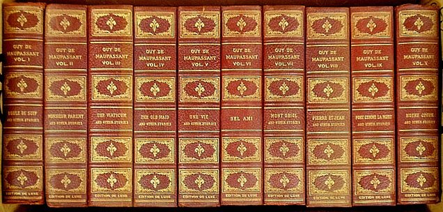 Books- red half-calf leather bound ten volume set of th: Books- red half-calf leather bound ten volume set of the works of Guy De Maupassant, Scribners 1909.