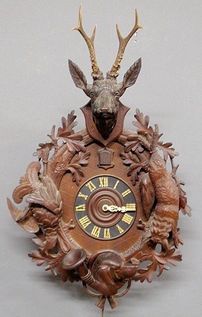 Black Forest carved German cuckoo clock, late 19th c. A: Black Forest carved German cuckoo clock, late 19th c. As found. 34”h.x21”w