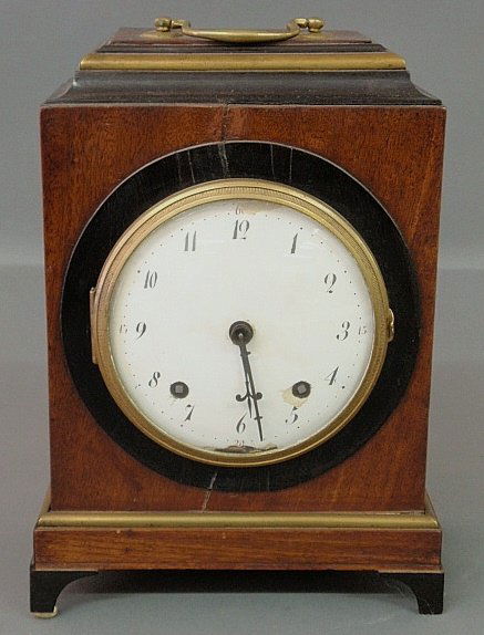Continental mahogany and ebony cased bracket clock, 19t: Continental mahogany and ebony cased bracket clock, 19th c., with a porcelain dial. As found. 12”h.x8.25”w.x4.25”d.