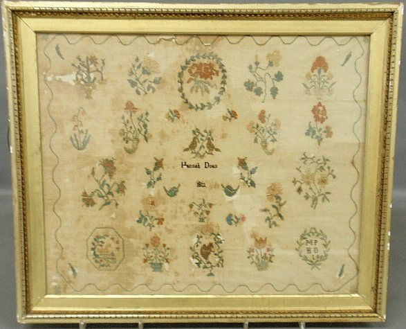 Silk on linen sampler wrought by Hannah Doan, 1812, wit: Silk on linen sampler wrought by Hannah Doan, 1812, with flowers and animals. As found. 17.75”x21.5”
