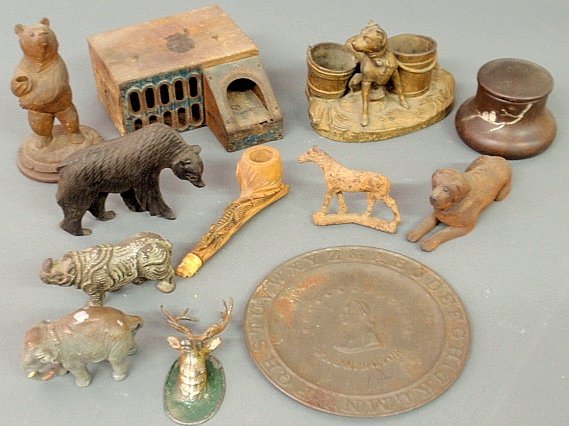 Misc. grouping- bronze Art Nouveau inkwell 2.5”h., pot : Misc. grouping- bronze Art Nouveau inkwell 2.5”h., pot metal seated dog, paint decorated metal stag’s head, carved dog, carved bear, mouse trap, etc.