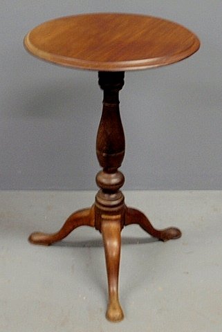Pennsylvania Queen Anne walnut candlestand, c.1780,: Pennsylvania Queen Anne walnut candlestand, c.1780, with turned shaft and snake feet. 27”h., top 17”dia.