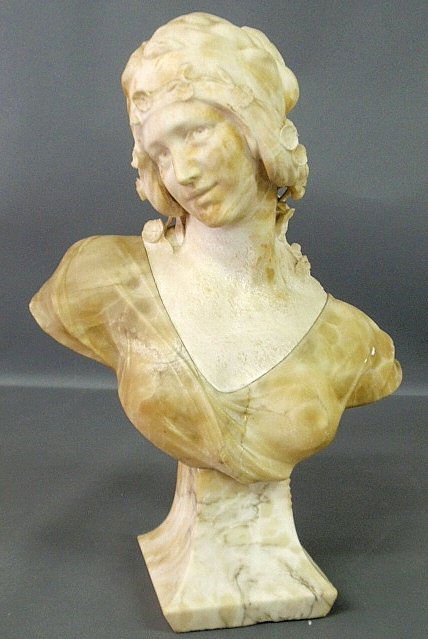 Carved alabaster bust of a woman, late 19th c., mounted: Carved alabaster bust of a woman, late 19th c., mounted on a square plinth. 24”h.x17”w.