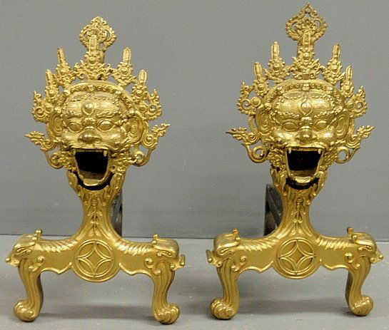 Pair of brass Asian style andirons, 20th c.: Pair of brass Asian style andirons, 20th c. 22”h.x13”w.x15”d.