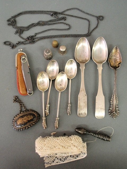 Group of sterling and coin silver, etc. TI: 4 English: Group of sterling and coin silver, etc. TI: 4 English apostle spoons 4”l., 2 coin silver spoons marked “TW”, “Scotch” decanter label, 3 thimbles, etc.