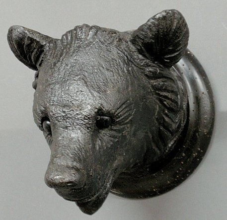 Black Forest carved bear head, late 19th c., with glass: Black Forest carved bear head, late 19th c., with glass eyes. 8”h.x8”w.x9.5”d.