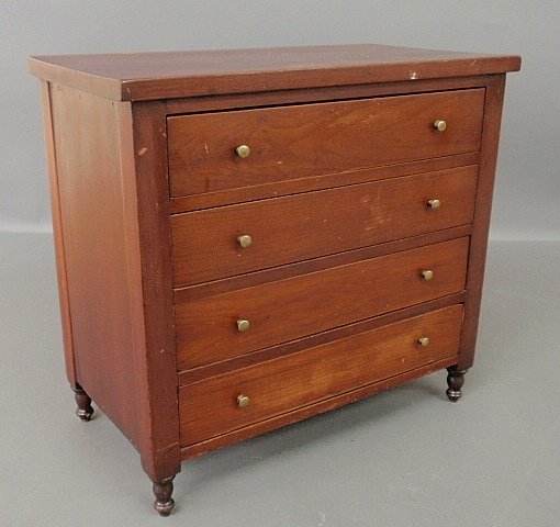 Miniature Sheraton mahogany chest of drawers, c.1830,: Miniature Sheraton mahogany chest of drawers, c.1830, with turned legs. 15.5"h.x16"w.
