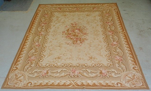 Aubusson style needlepoint carpet with floral: Aubusson style needlepoint carpet with floral decoration. 10'x12'