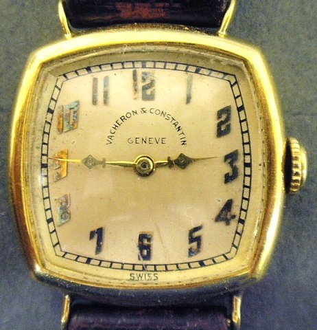 Vacheron & Constantin, Swiss Geneve ladies 18k gold and: Vacheron & Constantin, Swiss Geneve ladies 18k gold and 17 jewel wristwatch, case marked #252514 and the works with #407751, 0.75"x0.75" with a brown lizard strap.