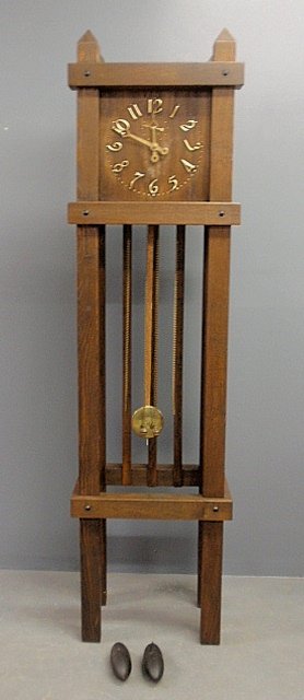 Mission oak style tall case clock with brass Arabic: Mission oak style tall case clock with brass Arabic numerals. 81"h.x21.5"w.
