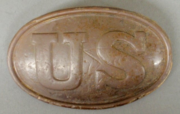 Civil War Federal cartridge box plate, original and: Civil War Federal cartridge box plate, original and complete with lead backing and metal loops. This plate was dug up on private property off Brooke Road in Stafford, Virginia, the site was a Federal 