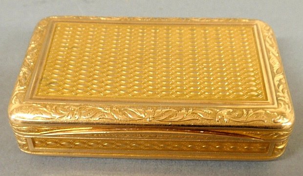 French 14k gold snuff box dated 1824, with chased leaf: French 14k gold snuff box dated 1824, with chased leaf decorated rim and monogrammed "G.M.". 48 pw 0.75"h.x3"w.x2"d.