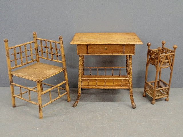 Three pieces of bamboo furniture- table 30h.x28"w.,: Three pieces of bamboo furniture- table 30h.x28"w., chair and umbrella stand."