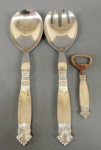 Georg Jensen sterling silver handled two-piece salad: Georg Jensen sterling silver handled two-piece salad set 10"l., and a bottle opener in the same pattern.