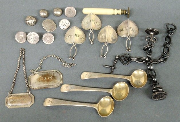 Group of early silver tableware and accessories TI 3: Group of early silver tableware and accessories TI 3 English salt spoons 3.5"l., 9 buttons, 4 sterling wine labels, sterling Madeira label, plate gin example and a metal chatelaine.