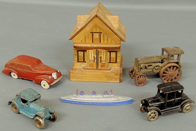 Misc. group of toys, etc. TI Arcade blue car 2"h., 1938: Misc. group of toys, etc. TI Arcade blue car 2"h., 1938 Oldsmobile, 6.5"l., by Auburn, Ind., Avery tractor, Tootsie Toy ocean liner 6"l., glass candy containers/dispensers and a Steuben glass "planet"