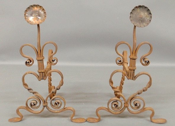 Pair of wrought iron and copper sunflower-form: Pair of wrought iron and copper sunflower-form andirons, possibly by Yellin. 7"h.x11"w.x10"d.