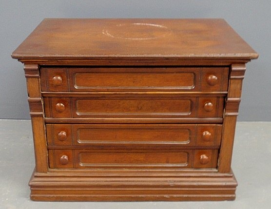 Oak spool cabinet, late 19th c., with four drawers and: Oak spool cabinet, late 19th c., with four drawers and molded base. 17"h.x23"w.x17"d.