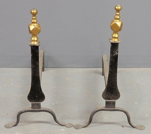 Pair of wrought iron knife-blade andirons, 18th c.,: Pair of wrought iron knife-blade andirons, 18th c., with faceted brass tops and penny feet. 19"h.x10.5"w.x15.5"d.