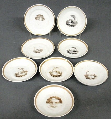 Group of eight Tucker, Philadelphia porcelain, c.1830,: Group of eight Tucker, Philadelphia porcelain, c.1830, saucers, deep dishes, etc., each with sepia landscape decoration, largest 6"dia.