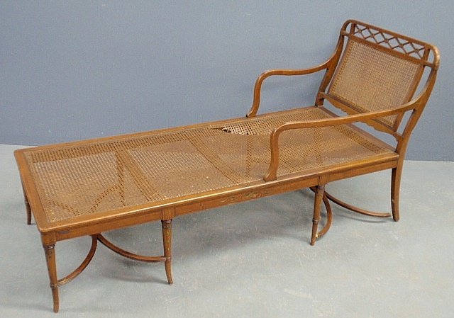 Sheraton style maple daybed with caned seat and back.: Sheraton style maple daybed with caned seat and back. As found. 33"h.x65"l.x26.5"w.