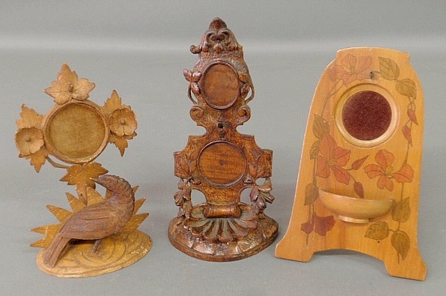 Three carved wood watch holders including a carved bird: Three carved wood watch holders including a carved bird Black Forest example 7.25"h.x4.5"w.